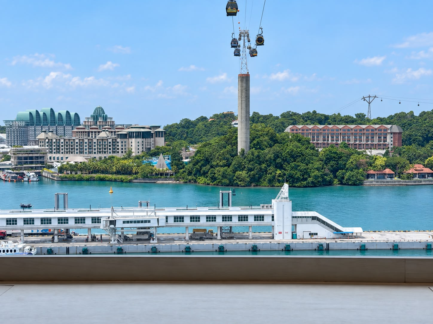 Sentosa waterfront and cable cars seen from HarbourFront Tower 2